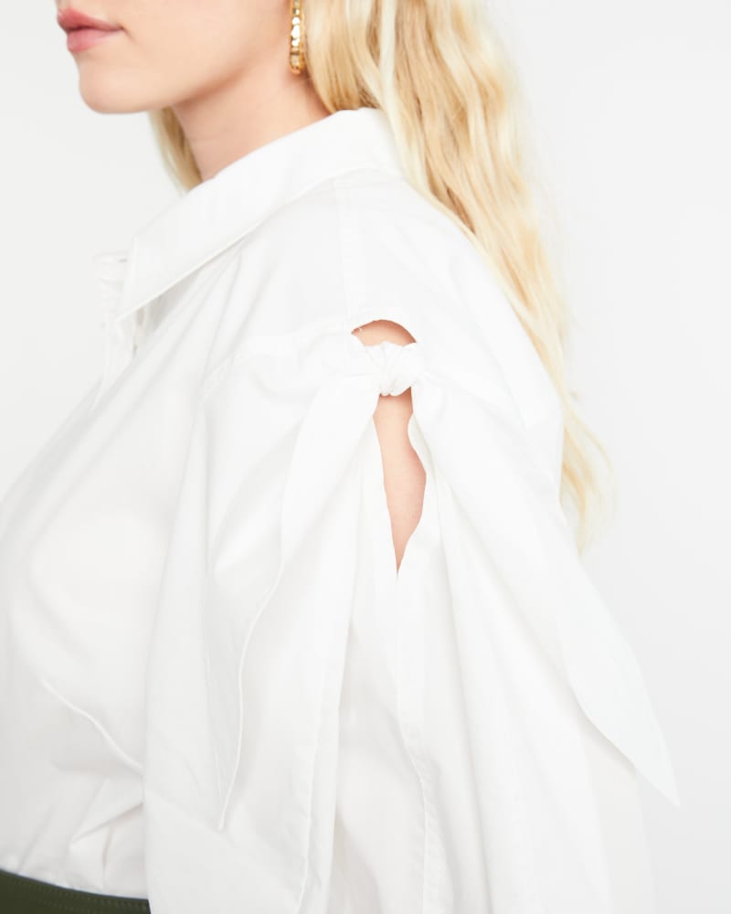 Side of a model wearing a size M Kinsley Top in OPTIC WHITE by Tanya Taylor. | dia_product_style_image_id:280295